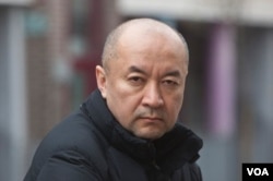 流亡英国的前新疆维吾尔族外科医生安华托帝·博格达 (Enver Tohti) (安华托帝·博格达 提供)