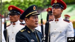 中国国防部长魏凤和上将2019年5月访问新加坡(法新社图片)