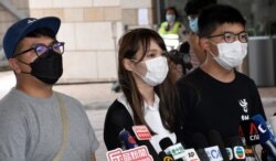 资料照:前香港众志秘书长黄之锋黃(右)、前成員周庭(中)、前主席林朗彥