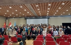 2020年11月25日,参加联合国驻华性别主题组在京举办纪念第21个“消除对妇女的暴力行为国际日”研讨会的代表。