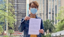 陈皓桓对警方质疑民阵违反《社团条例》感到诧异,表明不会逐一回应警方的提问。 (美国之音/汤惠芸)