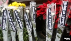 越南数十名抗议者星期二在河内市中心集会,纪念1974年的黄沙海战(中国称西沙之战)42周年(2016年1月16日)。