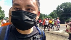 来自浙江的卢先生背着四岁的儿子,从南美洲步行北上,穿越墨西哥到美国 (照片本人提供)