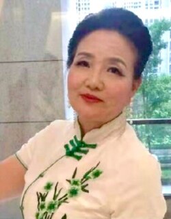 曾任中国奥委会官网副总编的高级记者张秀萍。(照片由本人提供)