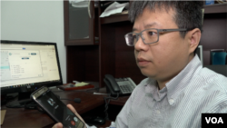 中国劳工观察执行主任李强(章真拍摄)