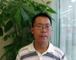 中国维权律师滕彪在北京一家餐厅里(2013年8月14日)