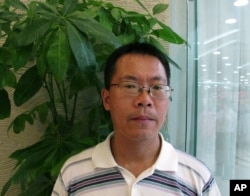 中国维权律师滕彪在北京一家餐厅里(2013年8月14日)