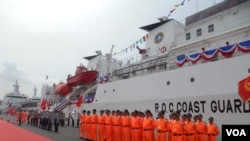 台湾自行设计建造的旗舰级3000吨巡防舰“宜兰舰”与“高雄舰”6月6日正式成军。(美国之音赵婉成拍摄)