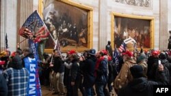 特朗普的支持者2021年1月6日闯入国会试图阻止国会认证总统大选结果。(法新社)