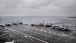 资料照片:美国海军尼米兹号航空母舰在孟加拉湾参加印度、日本和美国的三边演习。(2017年7月17日)