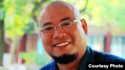 网名“超级低俗屠夫”的中国草根维权人士吴淦(网络图片)