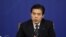 中国商务部部长钟山2018年3月11日出席记者会。