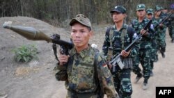 Karen National Union (KNU) တပ်ဖွဲ့ဝင်များကို ကရင့်အမျိုးသားနေ့နှစ်ပတ်လည်အခမ်းအနားတွင် တွေ့ရစဉ်။ ( ယခင်မှတ်တမ်းဓာတ်ပုံ)