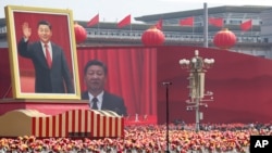 中共建政70周年的阅兵式上的中共领导人习近平画像。(2019年10月1日)
