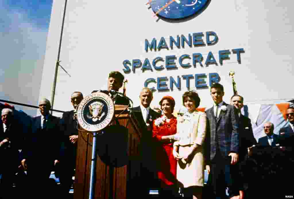 FILE - U.S. President John F. Kennedy pays tribute to astronaut John H. Glenn Jr. for his February 1962 flight aboard Friendship 7. The Mercury-Atlas 6 mission marked the free world's first orbital manned flight.