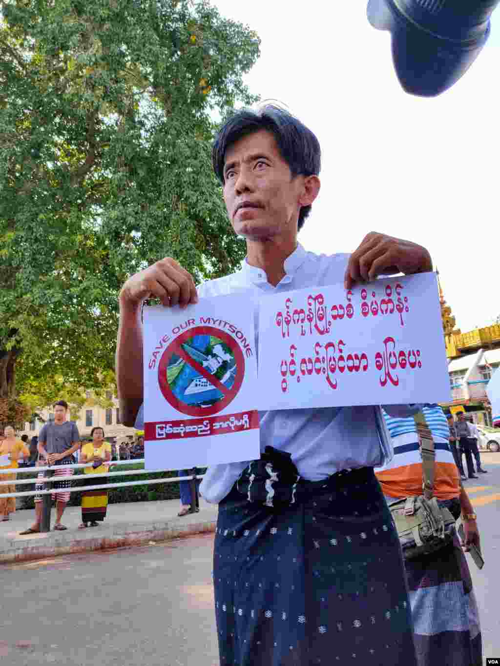 Activists stage a protest near City Hall in Myanmar's commercial city Yangon, calling for transparency in business ties with China on Saturday January 18, 2020