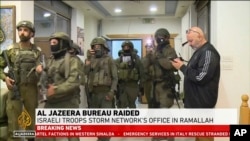 半岛电视台英语频道提供的影片显示,以色列军队于2024年9月22日袭击了该媒体位于约旦河西岸拉马拉的分社。(美联社)