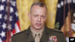Riot police use a water cannon to disperse anti-government protesters near the Middle East Technical University (ODTU) in Ankara, Turkey. A 15-year-old Turkish boy, who suffered a head injury during anti-government protests in Istanbul last June, died after spending months in a coma, triggering renewed clashes between police and his family's supporters.