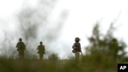 Тренування українських новобранців у Великій Британії, 12 жовтня 2022. (AP Photo/Kirsty Wigglesworth)