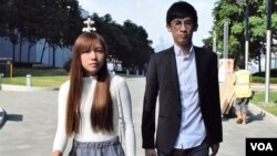 香港本土派青年新政梁督恒及游蕙祯。(美国之音汤惠芸拍摄)