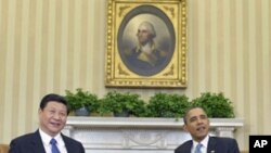 中国国家副主席习近平2月14日在白宫与美国总统奥巴马会晤