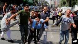 Vụ nổ ở Rafah xảy ra trong lúc người tản cư xếp hàng nhận thức ăn.