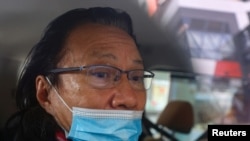 香港九龙城区议员黄国桐2021年1月14日被警方逮捕(路透社)