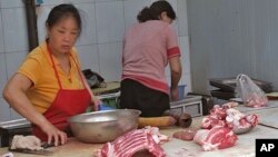 北京农贸市场上,中国猪肉价格猛涨