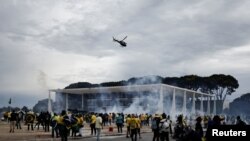 Supporters of Brazil's former President Jair Bolsonaro demonstrate against President Luiz Inacio Lula da Silva, in Brasilia
