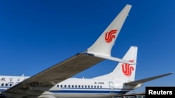 资料照:中国国航的波音737 MAX飞机停在北京的一个机场(路透社2019年3月11日)