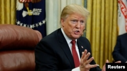 美国总统特朗普在华盛顿白宫椭圆形办公室与中国国务院副总理刘鹤见面。(2019年1月31日)