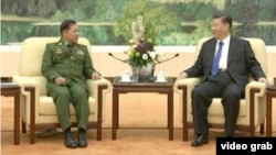 中国国家主席习近平2017年11月24日在北京会见缅甸国防军总司令敏昂莱(视频截图)