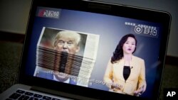 通过网络播放的中国国际电视台的一段有关美中贸易紧张关系的视频(2018年8月23日)