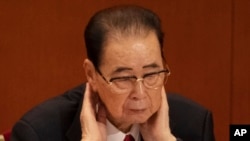 李鹏在中共19大闭幕式上。(AP 图片)