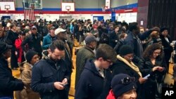 အမေရိကန်ရွေးကောက်ပွဲ မဲဆန္ဒရှင်များ စတင်မဲပေးနေပါပြီ (သတင်းဓါတ်ပုံများ)