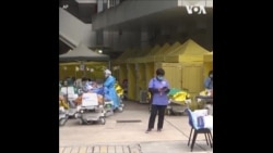 香港新冠病毒感染继续攀升 医院不堪重负  香港新冠病毒感染继续攀升 医院不堪重负