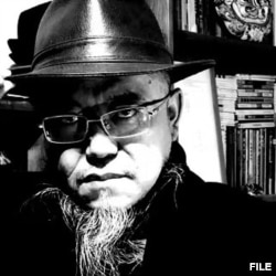 中国异议人士、诗人季风 (资料照片)