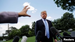 特朗普总统前往路易斯安那州前在白宫对记者谈话。(2019年5月14日)