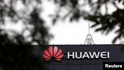 在加拿大渥太华的华为公司研究所外的标记。(2018年12月6日)