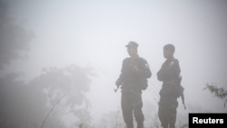 资料照片:缅甸钦邦境内的反政府武装人员(2019年1月31日)