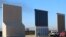  Three of U.S. President Donald Trump's eight border wall prototypes are shown near completion along U.S.- Mexico border in San Diego, California, Oct. 23, 2017. 