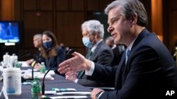 美情报界主管在参议院情报委员会就世界范围的威胁举行的听证会上作证。从左至右为:国家安全局局长中曾根、国家情报总监海恩斯、中央情报局局长伯恩斯和联邦调查局局长克里斯托弗·雷。 (2021年4月14日)