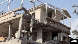 Hezbollah တိုက်ခိုက်မှု တိုက်ခိုက်မှုကြောင့် ပျက်ဆီးသွားတဲ့ အစ္စရေးနိုင်ငံ Tira မြို့အတွင်းရှိ အဆောက်အဦးအချို့ (Photo by JACK GUEZ / AFP)