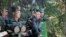 This Oct. 2, 2024, photo from North Korea's official Korean Central News Agency via KNS on Oct. 4, 2024, shows North Korea's leader Kim Jong Un, center, inspecting a training base of the Korean People's Army at an undisclosed location.