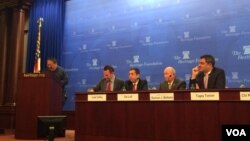 何志平在美国传统基金会举办的座谈会上讲话。(2015年12月9日)