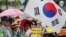 韩国民众2016年7月18日首尔集会，支持部署萨德