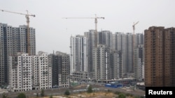 资料照:北京的一处居民区工地(2018年9月27日)