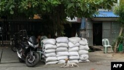 မန္တလေးမြို့ပေါ်က လုံခြုံရေးကင်းတခု ( ဓာတ်ပုံ - AFP)