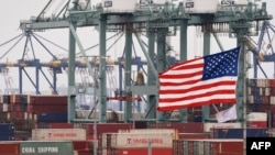 资料照片:美国加利福尼亚州长滩港口装满中国进口商品的集装箱。(2019年5月14日)