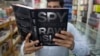Книга "Шпигунські хроніки". Аналітики висловлюють запитання до НАТО про те, як російські ймовірні шпигуни потрапили на роботу у штаб-квартину альянсу після заяв генсека Столтенберга про звільнення підозрбваних у шпигунстві осіб. AP Photo/B.K. Bangash